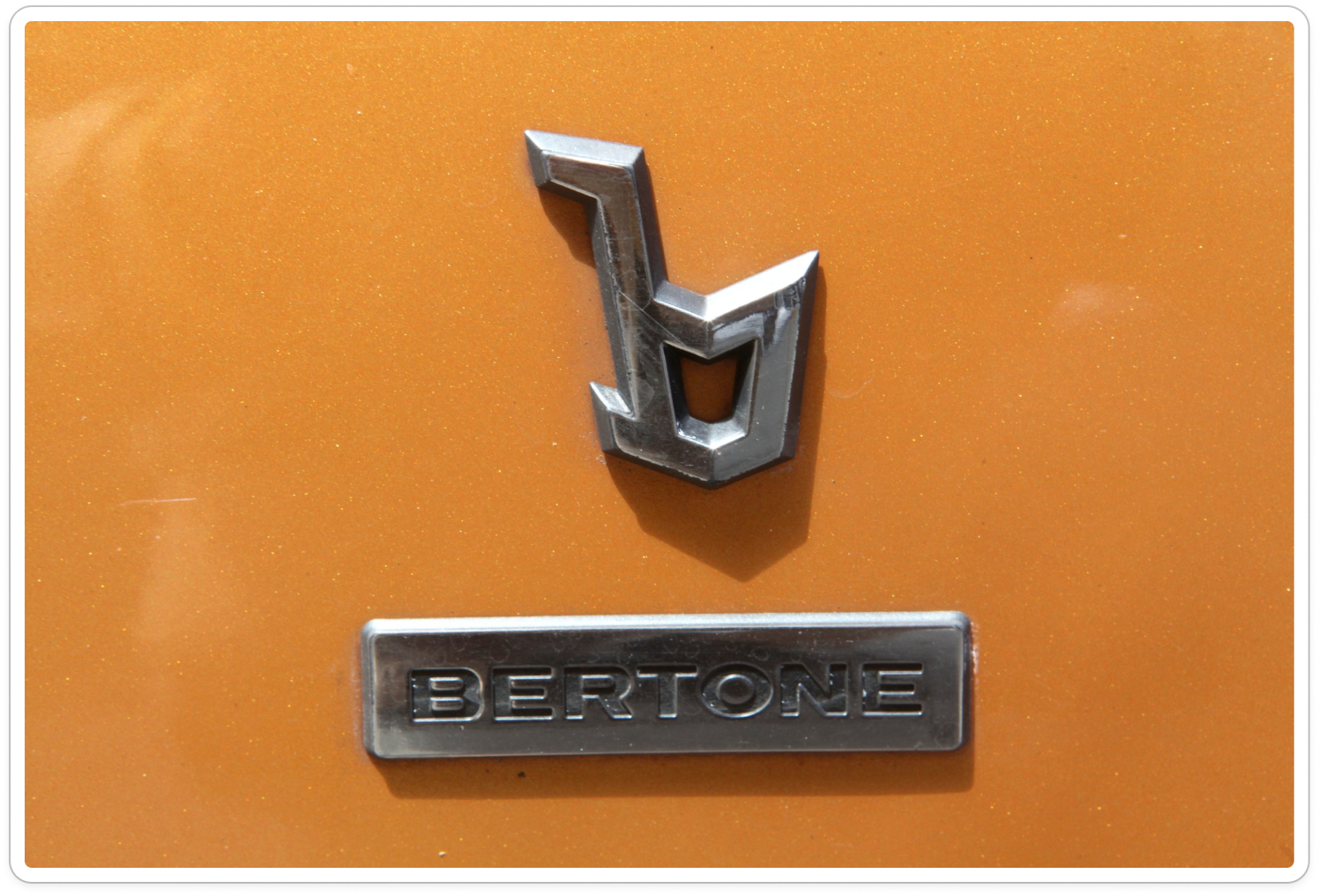 geometric lowercase b stacked above a "bertone" badge in capital letters 